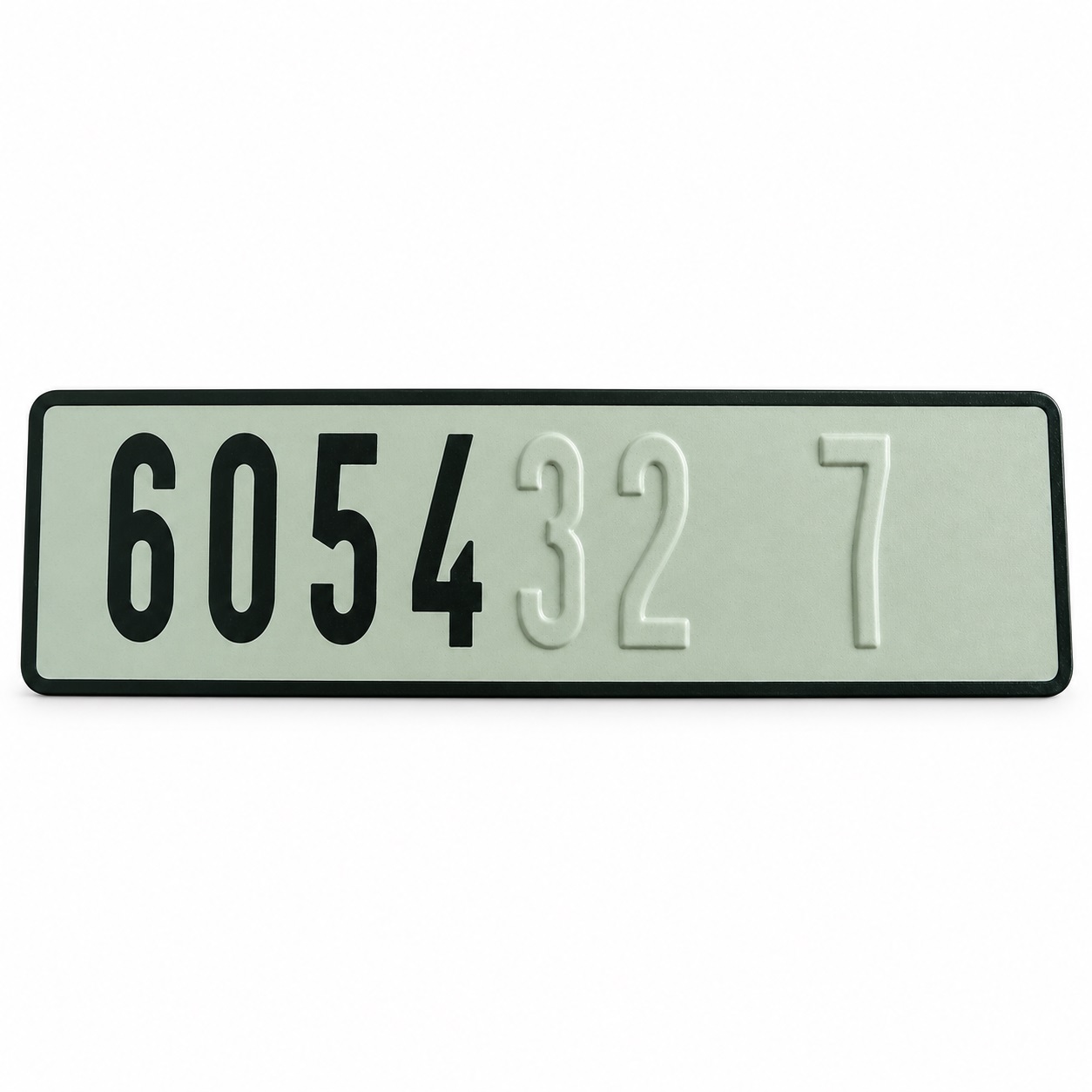 Partially peeled embossed plate sample with black revealed numbers and remaining covered characters